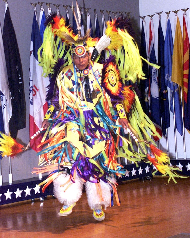 Men's fancy dancer Hunter Osborne performs during the "Voices:  Native American Women in the U.S. Armed Forces" program at the Women in  Military Service for America Memorial. Photo by Rudi Williams