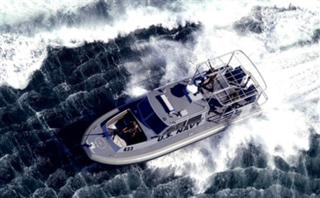 A U.S. Navy patrol boat from Inshore Boat Units Five One and Five Two conducts operations near the Coronado Bay Bridge in San Diego, Calif., Feb. 5, 2007. The two units are part of Naval Coastal Warfare Squadron Five.