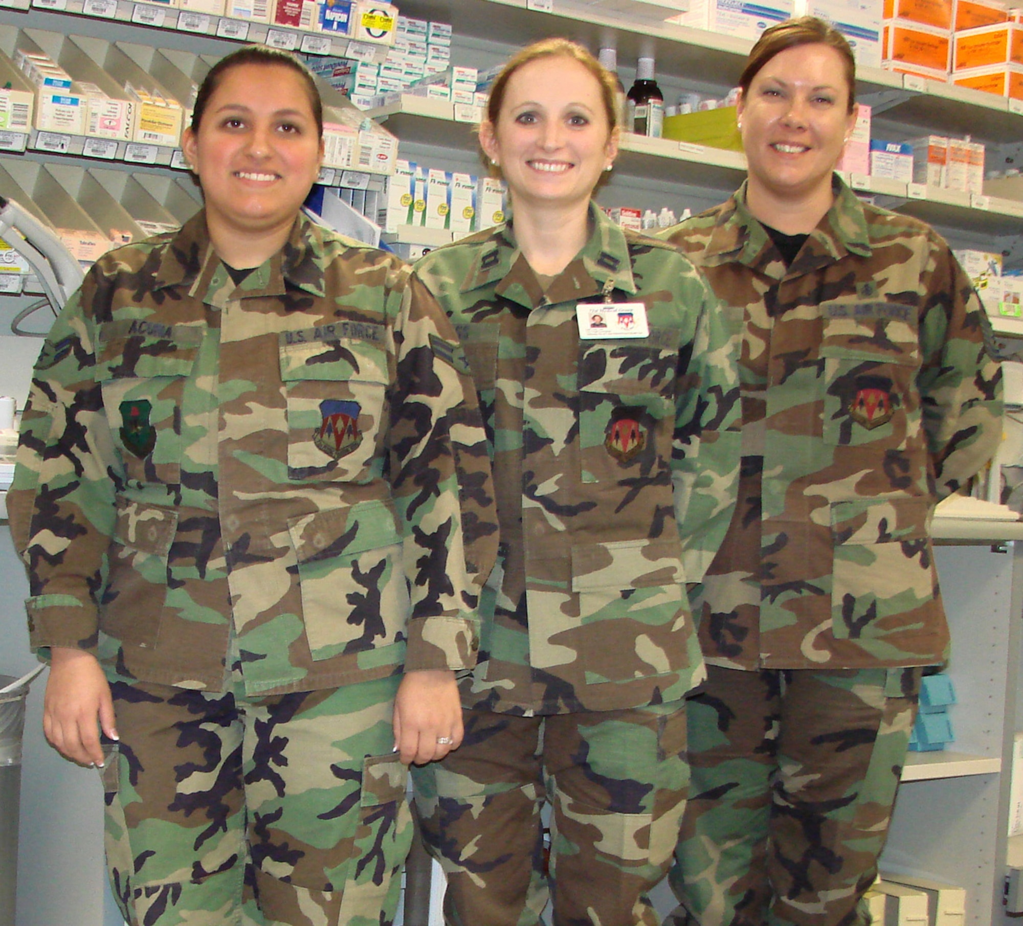 The 71st Medical Group’s pharmacy was named the best in the Air Force during last week’s Military Health System conference. Members of the award-winning team include Airman 1st Class Alicia Acuna, Capt. Leah Cross and Tech Sgt. Jill Clow. The other team member, Senior Airman Andreia Mitchell, is attending Airman Leadership School and was not available for the photograph. (Photo by Frank McIntyre)   