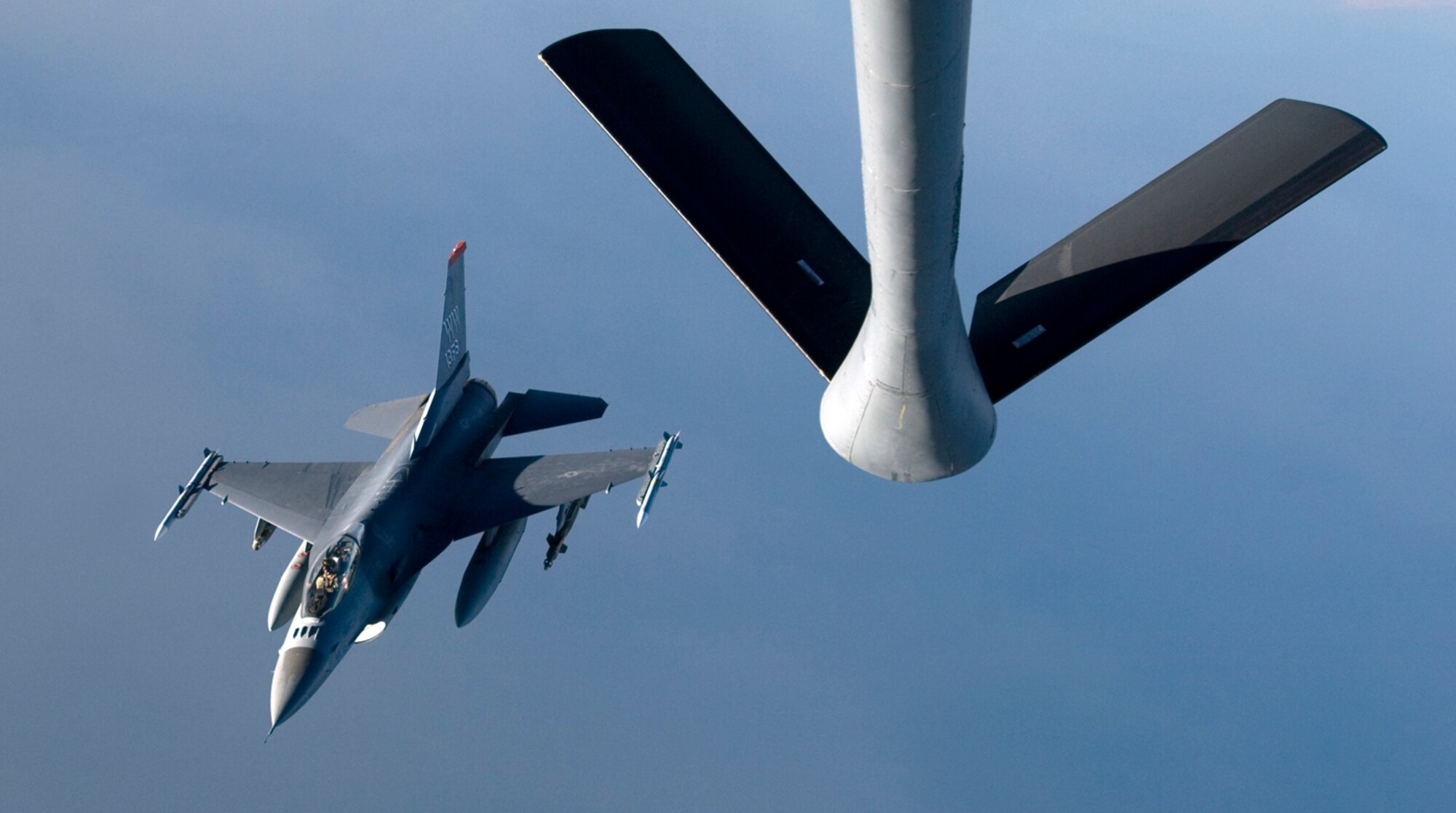 A F-16 Fighting Falcon detaches from a KC-135 Stratotanker after refueling over Iraq in support of Operation Iraqi Freedom. On Jan. 29, U.S., French and Royal Air Force tankers flew 25 sorties and off-loaded almost 1.6 million pounds of fuel in support of OIF and Operation Enduring Freedom. (U.S. Air Force photo/Tech. Sgt. Cecilio M. Ricardo Jr.) 

