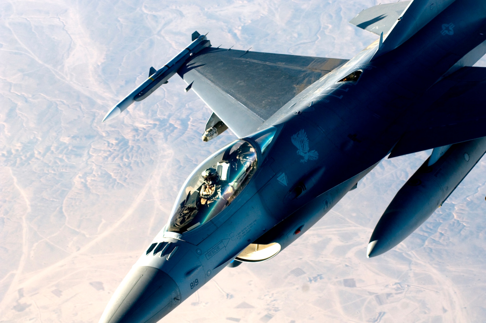 A F-16 Fighting Falcon detaches from a KC-135 Stratotanker after refueling over Iraq in support of Operation Iraqi Freedom. On Jan. 29, U.S., French and Royal Air Force tankers flew 25 sorties and off-loaded almost 1.6 million pounds of fuel in support of OIF and Operation Enduring Freedom. (U.S. Air Force photo/Tech. Sgt. Cecilio M. Ricardo Jr.) 
