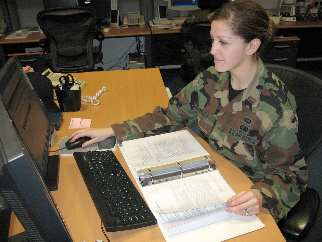 2nd Lt. Gwendolyn Soden works on the reintegration sharepoint Web site Feb. 9 at Ramstein Air Base, Germany. The site has answers to questions about the reintegration program and includes U.S. Air Forces in Europe policies, the process for the reintegration line and checklists. (U.S. Air Force photo/Airman 1st Class Mara Title)