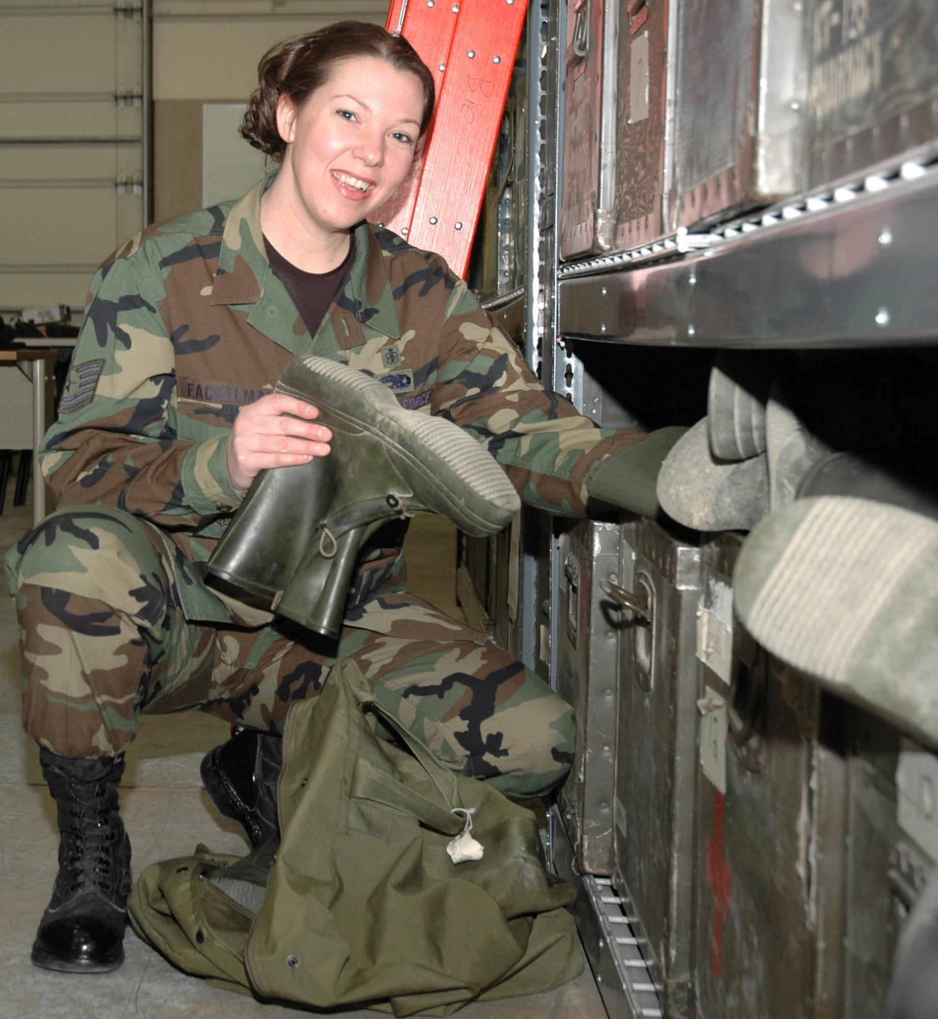 MOUNTAIN HOME AIR FORCE BASE, Idaho -- Tech. Sgt. Stacey Fackelman takes inventory of combat gear stored in the base hospital’s war readiness warehouse. Over the past year, the sergeant reviewed nearly 250 mobility records to prepare her unit for the wing’s unit compliance inspection, which helped the wing reach a 99 percent compliance rating during the higher headquarters evaluation. Air Force photo by Airman Samantha S. DeVries