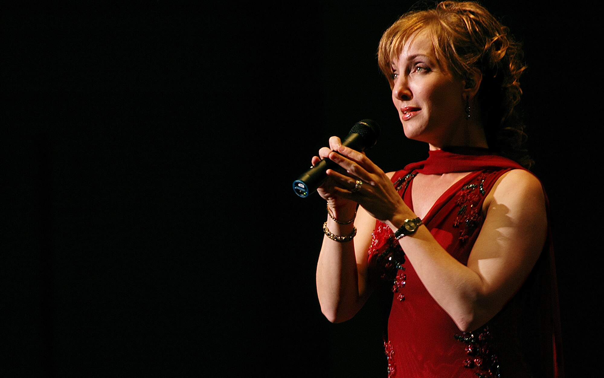 Master Sgt. Laura Noel, a vocalist with the Air Force Band of Liberty, Hanscom Air Force Base, Mass., during a holiday concert at the Springfield Symphony Hall. Hanscom's Liberty Big Band performed locally on Feb. 11 at the Palmer High School auditorium in Palmer, Mass. (U.S. Air Force photo/Senior Airman Michael Lanza) 