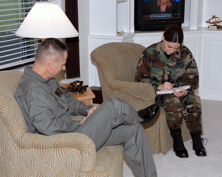Gen. Peter Pace, Chairman of the Joint Chiefs of Staff, answers questions during an interview with Capt. Vanessa Hillman, 60th Air Mobility Wing Public Affairs. General Pace visited Travis Feb. 8 during a refueling stop en route to Hawaii. (U.S. Air Force photo by David Cushman) 