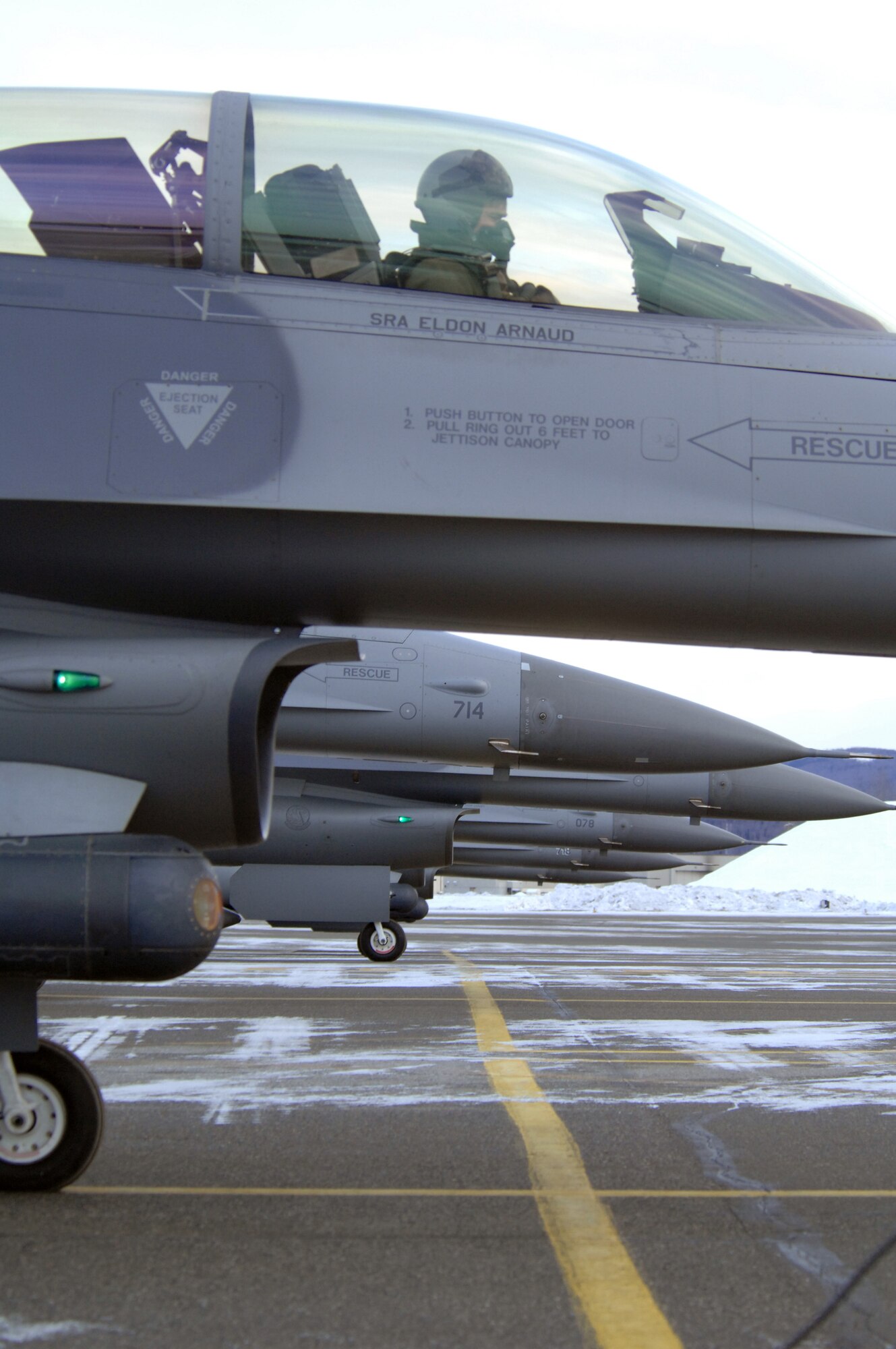 EIELSON AIR FORCE BASE, Alaska -- F-16 Fighting Falcon aircraft from the 18th Fighter Squadron sit on the flightline here prior to taking off for a training mission on Feb.8. The 18th Fighter Squadron conducts air operations for combat-ready F-16 aircraft and provides close air support, forward air control (airborne), battlefield air interdiction, and offensive counter air.
(U.S. Air Force Photo by Staff Sgt Joshua Strang)