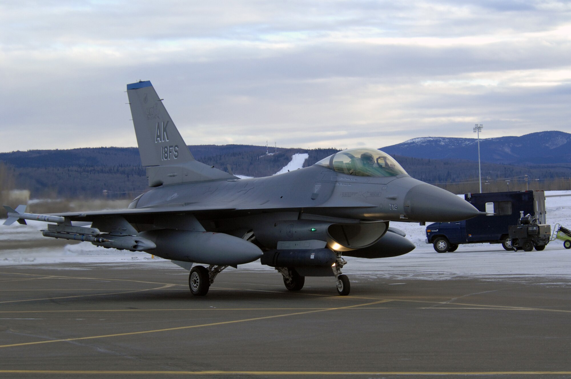 EIELSON AIR FORCE BASE, Alaska -- An F-16C Fighting Falcon aircraft from the 18th Fighter Squadron taxis on the flightline here prior to taking off for a training mission on Feb.8. The 18th Fighter Squadron conducts air operations for combat-ready F-16 aircraft and provides close air support, forward air control (airborne), battlefield air interdiction, and offensive counter air.
(U.S. Air Force Photo by Staff Sgt Joshua Strang)