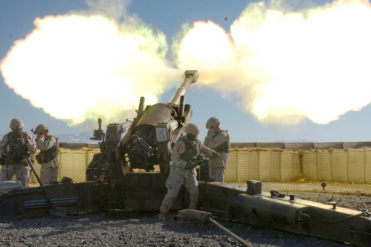 Army Spc. Ontario Smith, a cannon crewmember for Battery F, 7th Field Artillery Regiment, pulls