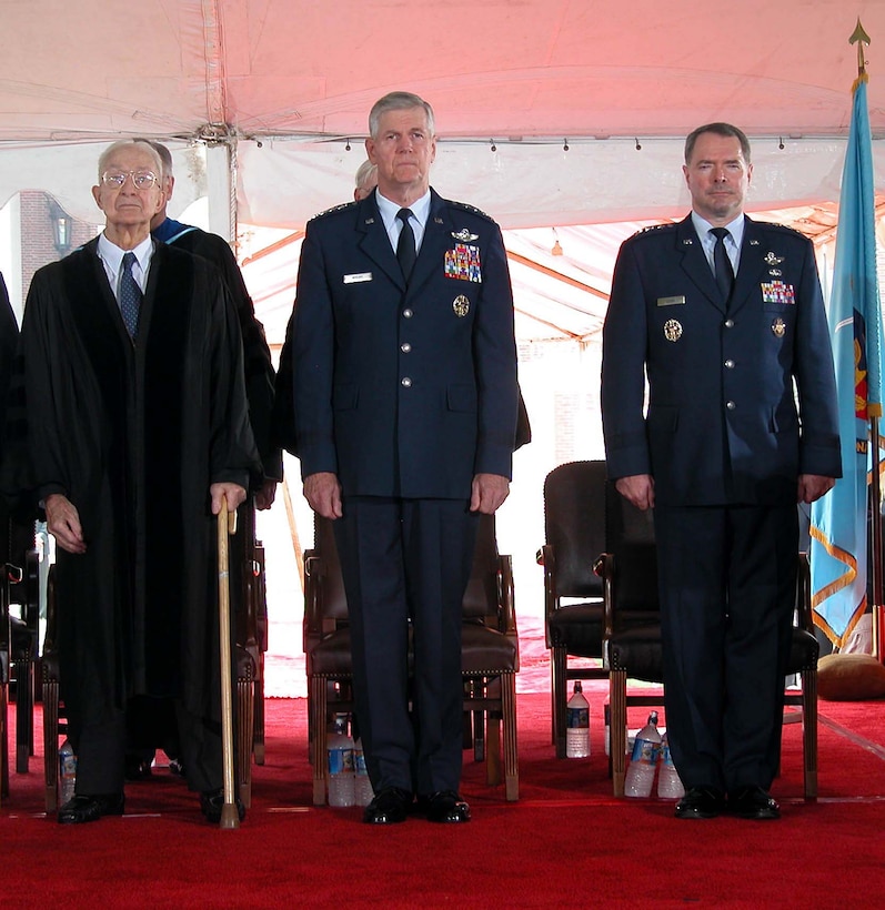 Retired Army Gen. Andrew J. Goodpaster, left, Air Force Gen. 
Richard B. Myers and Air Force Lt. Gen. Michael M. Dunn, stand at attention 
during graduation exercises at the National Defense University today. 
Goodpaster received an honorary doctorate degree at the graduation. Myers, 
chairman of the Joint Chiefs of Staff, delivered the graduation address; Dunn 
is NDU's president. Photo by Jim Garamone