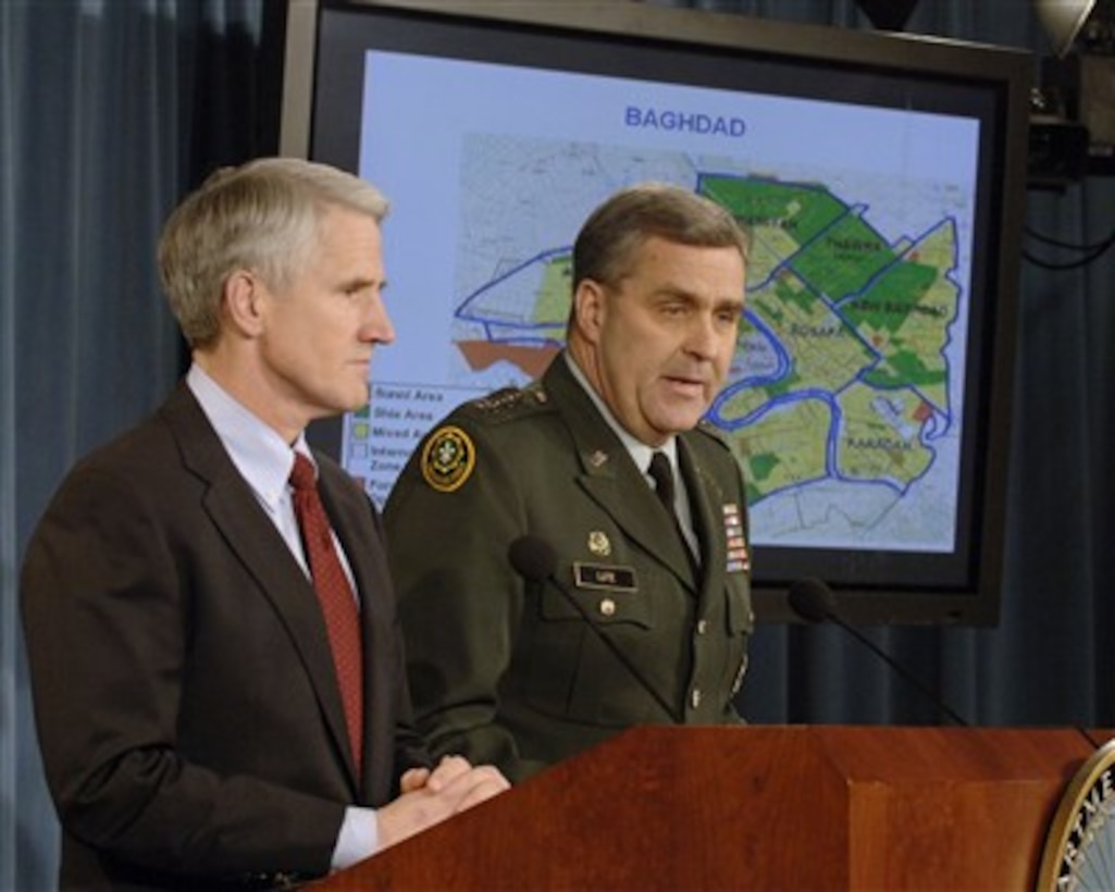 Director for Operations for the Joint Staff Lt. Gen. Douglas Lute (right), U.S. Army, and Deputy Assistant Secretary of Defense for Middle East Mark Kimmitt conduct an operational update briefing in the Pentagon on Feb. 9, 2007.  DoD photo by Helene C. Stikkel.  (Released)