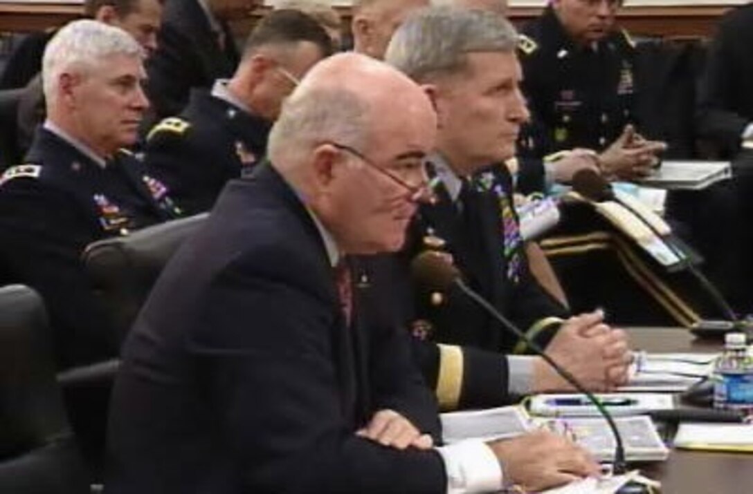 Secretary of the Army Francis Harvey (center) and Army Chief of Staff Gen. Peter Schoomaker (right) respond to questions before the House Appropriations Defense Subcommittee, Feb. 9, 2007. Both are testifying on the Army's Fiscal Year 2007 war supplemental appropriations.