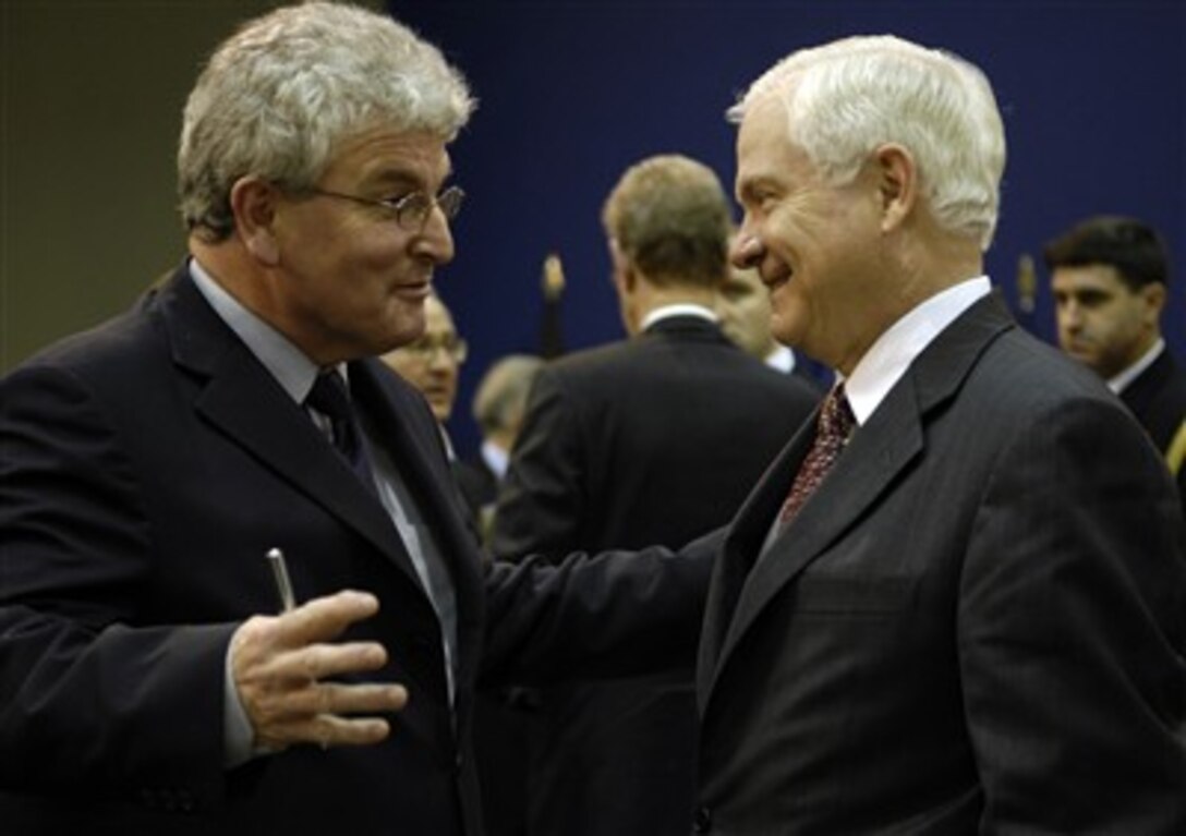 Secretary of Defense Robert Gates (right) speaks with Secretary of State for Defense of the United Kingdom Desmond Browne during the NATO Defense Ministerial in Seville, Spain, on Feb. 8, 2007.  Gates and other NATO defense ministers are meeting informally in Seville to freely discuss key issues concerning the alliance.  