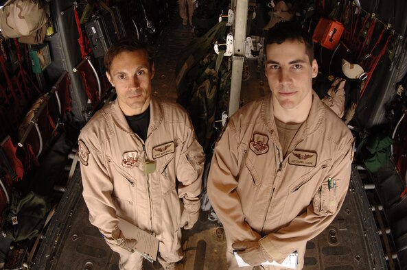 Airman 1st Class Daniel Stone (right), 746th Expeditionary Airlift Squadron loadmaster, works alongside Tech. Sgt. Matt Rossi, 746th EAS loadmaster, during his first deployment rotation. Newly certifed loadmasters are paired up with experienced Airmen to master the intricacies associated with serving as a C-130H loadmaster. (U.S. Air Force photo by Staff Sgt. David Miller)