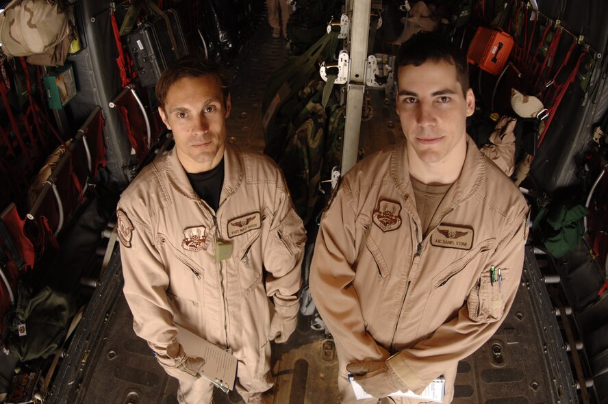 Airman 1st Class Daniel Stone (right), 746th Expeditionary Airlift Squadron loadmaster, works alongside Tech. Sgt. Matt Rossi, 746th EAS loadmaster, during his first deployment rotation. Newly certifed loadmasters are paired up with experienced Airmen to master the intricacies associated with serving as a C-130H loadmaster. (U.S. Air Force photo by Staff Sgt. David Miller)