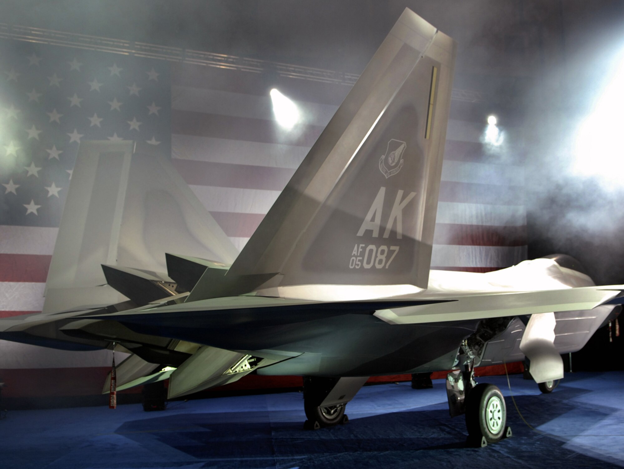 MARIETTA, Ga -- Representatives from the U.S. Air Force and Lockheed Martin gathered, Feb 12, 2007, to see the roll-out of Pacific Air Forces' first F-22. This F-22 is the first of several that will be assigned to PACAF at Elmendorf Air Force Base, Alaska. 