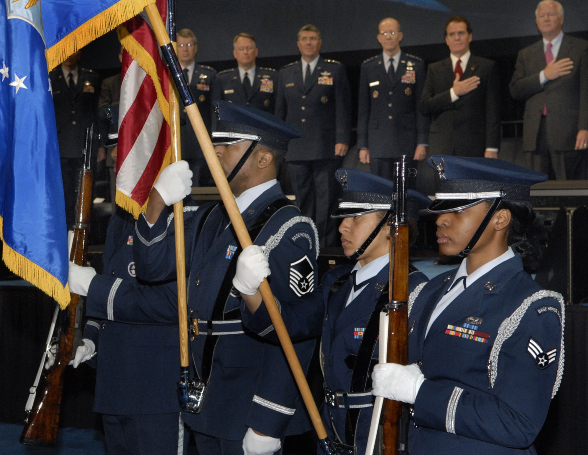 MARIETTA, Ga -- The U.S. Air Force Color Guard and representatives from the U.S. Air Force and Lockheed Martin gathered, Feb 12, 2007, to see the roll-out of Pacific Air Forces' first F-22. This F-22 is the first of several that will be assigned to PACAF at Elmendorf Air Force Base, Alaska. 
