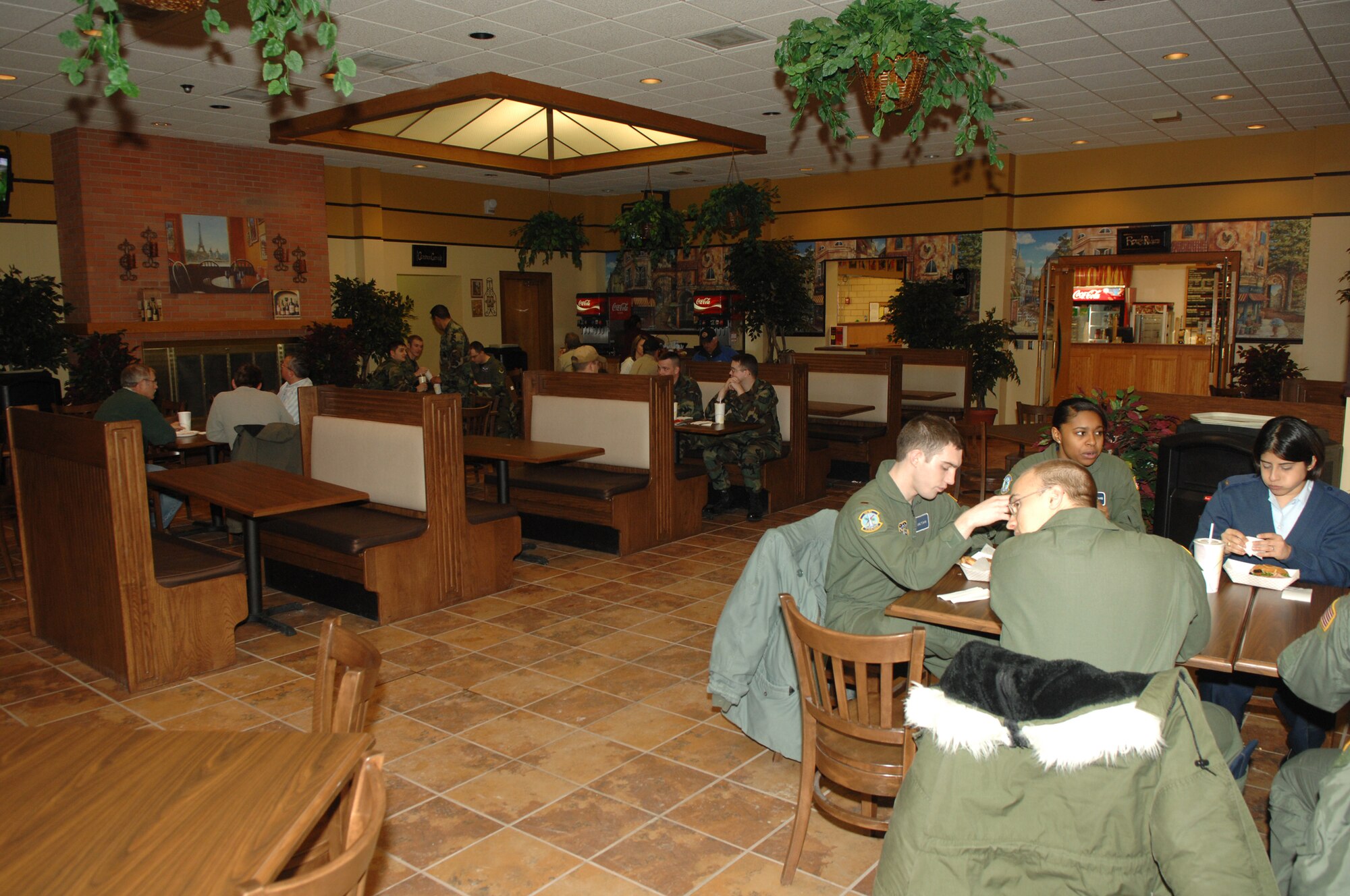 MINOT AIR FORCE BASE, N.D. -- Members of the base community eat lunch in the base community center here. The base community center was recently selected Best Collocated Club in Air Combat Command for 2006.
