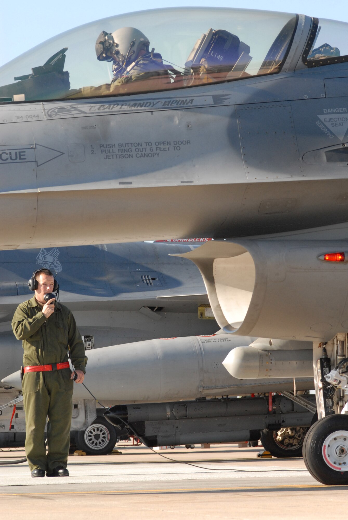 Staff Sgt. Donald Slayton performs a preflight inspection before launching an F-16 Fighting Falcon in support of Exercise Iron Thunder Feb. 7 at Shaw Air Force Base, S.C. The objective of the exercise is to prepare units for future contingency operations by offering a chance for players to be exposed to missions identical to those faced in combat. Sergeant Slayton is a 77th Fighter Squadron crew chief. (U.S. Air Force photo/Tech. Sgt. James W. Arrowood)
