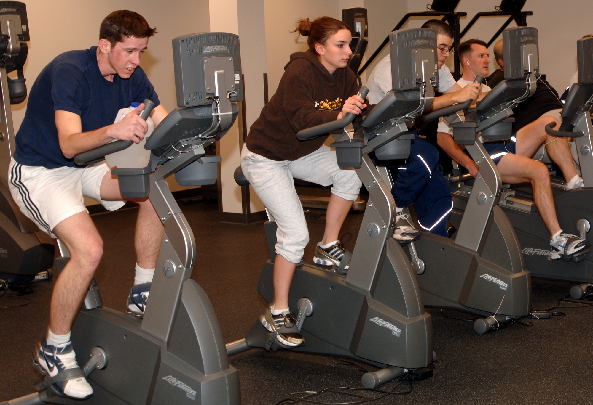 MINOT AIR FORCE BASE, N.D. – Members of the base community exercise at the McAdoo Sports and Fitness Center. The fitness center’s new operating hours beginning Feb. 20 will be from 5 a.m. to midnight Monday through Friday and from 8 a.m. to 6 p.m. Saturdays, Sundays and holidays. For more information, call 723-2145.