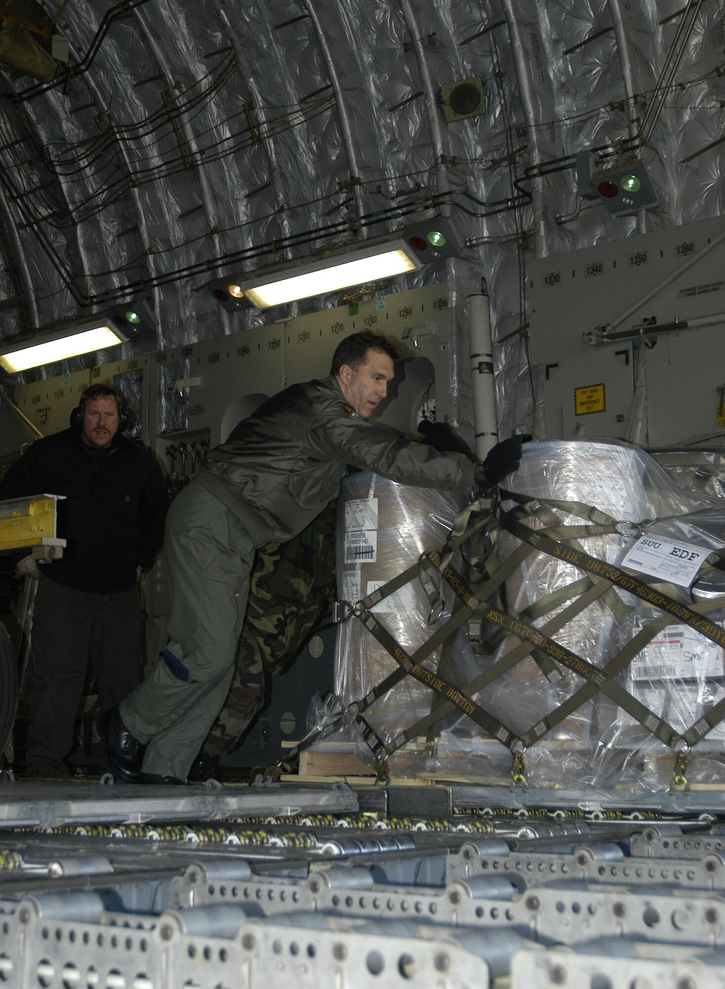 Senior Master Sgt. Randy Munroe, 317 AS, Charleston AFB, S.C., offloads pallets at Elmendorf AFB, AlaskA during a recent Pacific Express mission.                