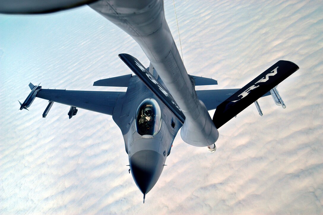 GRISSOM AIR RESERVE BASE, Ind., -- An F-16 Fighting Falcon prepares to be refueled by a KC-135R Stratotanker from the 434th Air Refueling Wing during a recent mission. Members of the 434th ARW routinely deploy around the world in support of various Air Force missions.  (U.S. Air Force photo/Senior Airman Mark Orders-Woempner)