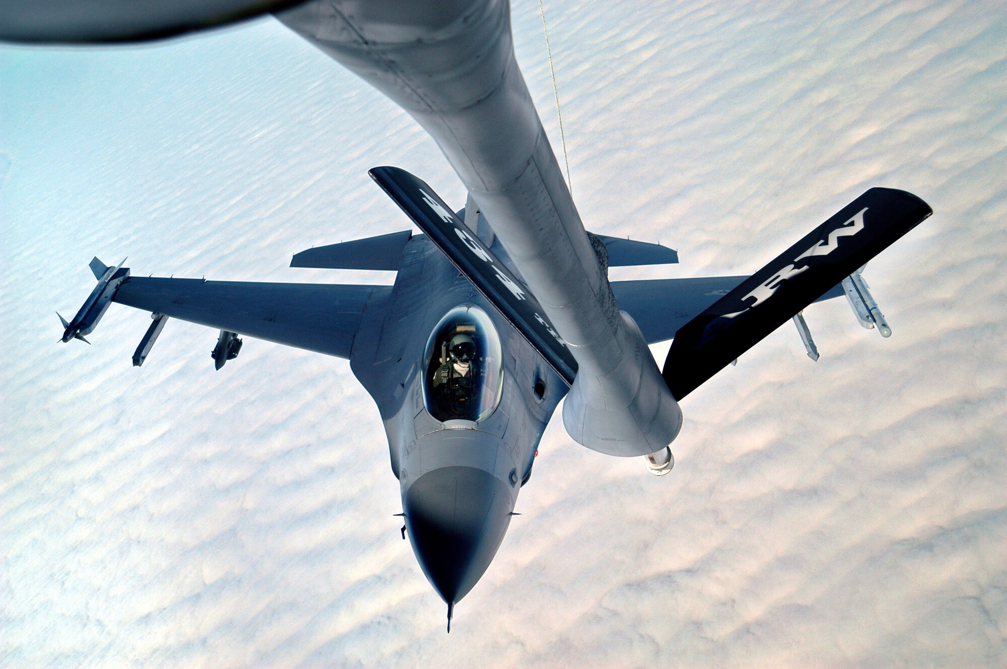 GRISSOM AIR RESERVE BASE, Ind., -- An F-16 Fighting Falcon prepares to be refueled by a KC-135R Stratotanker from the 434th Air Refueling Wing during a recent mission. Members of the 434th ARW routinely deploy around the world in support of various Air Force missions.  (U.S. Air Force photo/Senior Airman Mark Orders-Woempner)