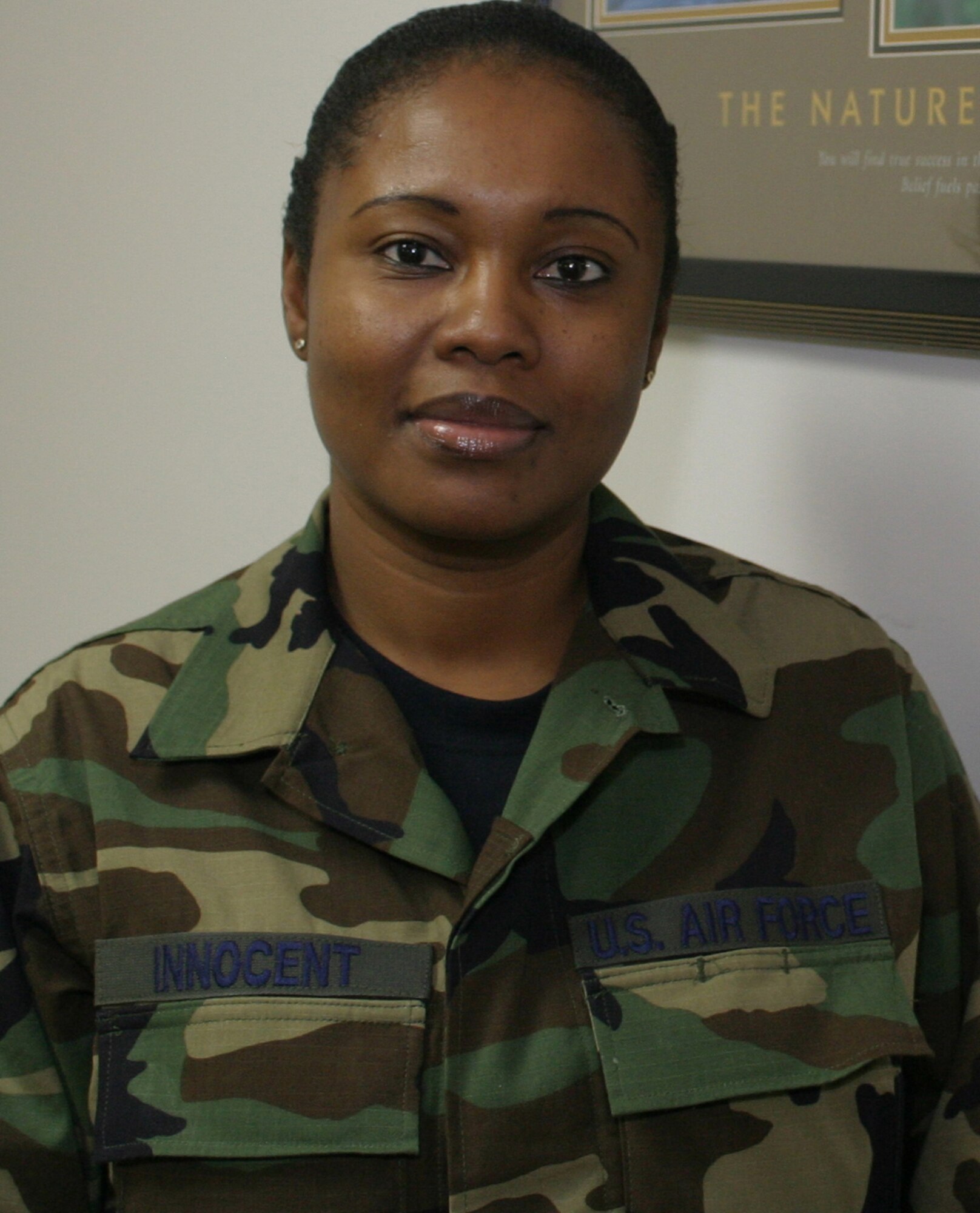 Senior Airman Patricia Innocent manages the newcomer flight for Air Force Reserve Command’s 482nd Fighter Wing.  She recently earned the Teacher of the Year award at the Barbara Hawkins Elementary School in North Miami-Dade County.  Airman Innocent, a mother of two who is also pursuing a master's degree in mathematics, says her military experience gives her the strength to be a firm teacher. (U.S. Air Force photo/Tech. Sgt. Paul Dean)