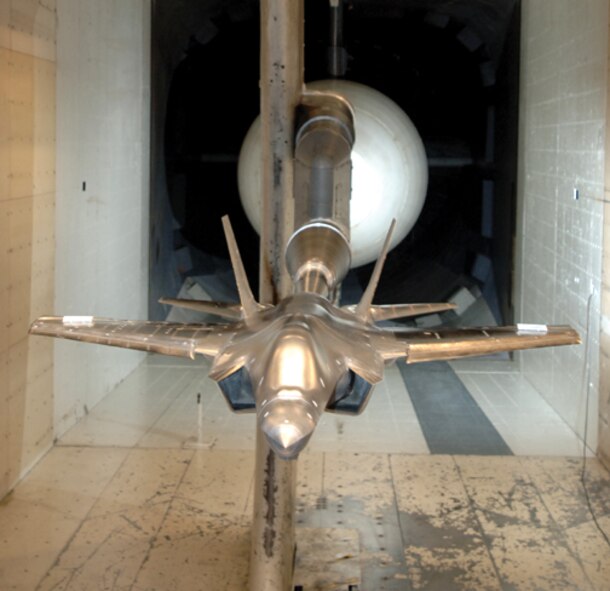 The model undergoes aerodynamics loads testing.
