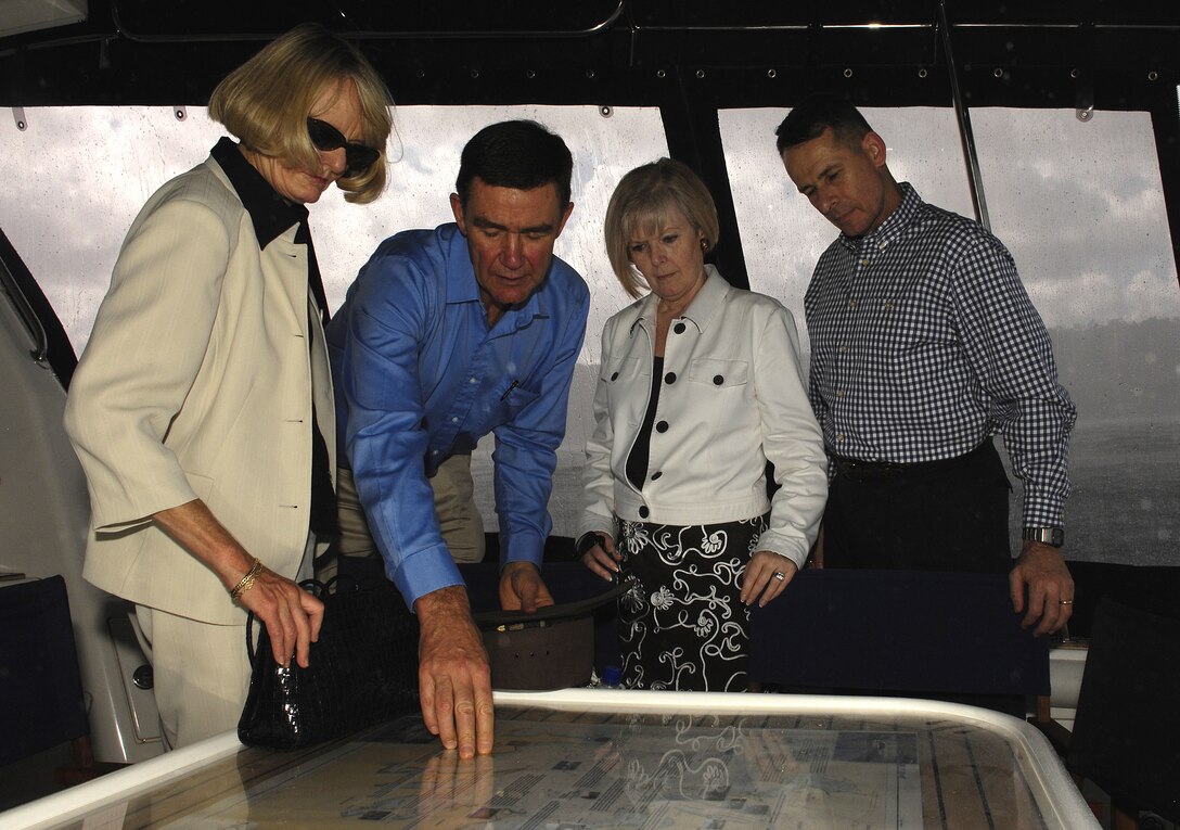 Australian Chairman of Defense Air Chief Marshal Angus Houston, his wife, Liz, and U.S. Chairman of the Joint Chiefs of Staff Marine Gen. Peter Pace, and his wife, Lynne, review a map of the Sydney Harbor while riding a boat, Sydney, Australia, Feb. 11, 2007.