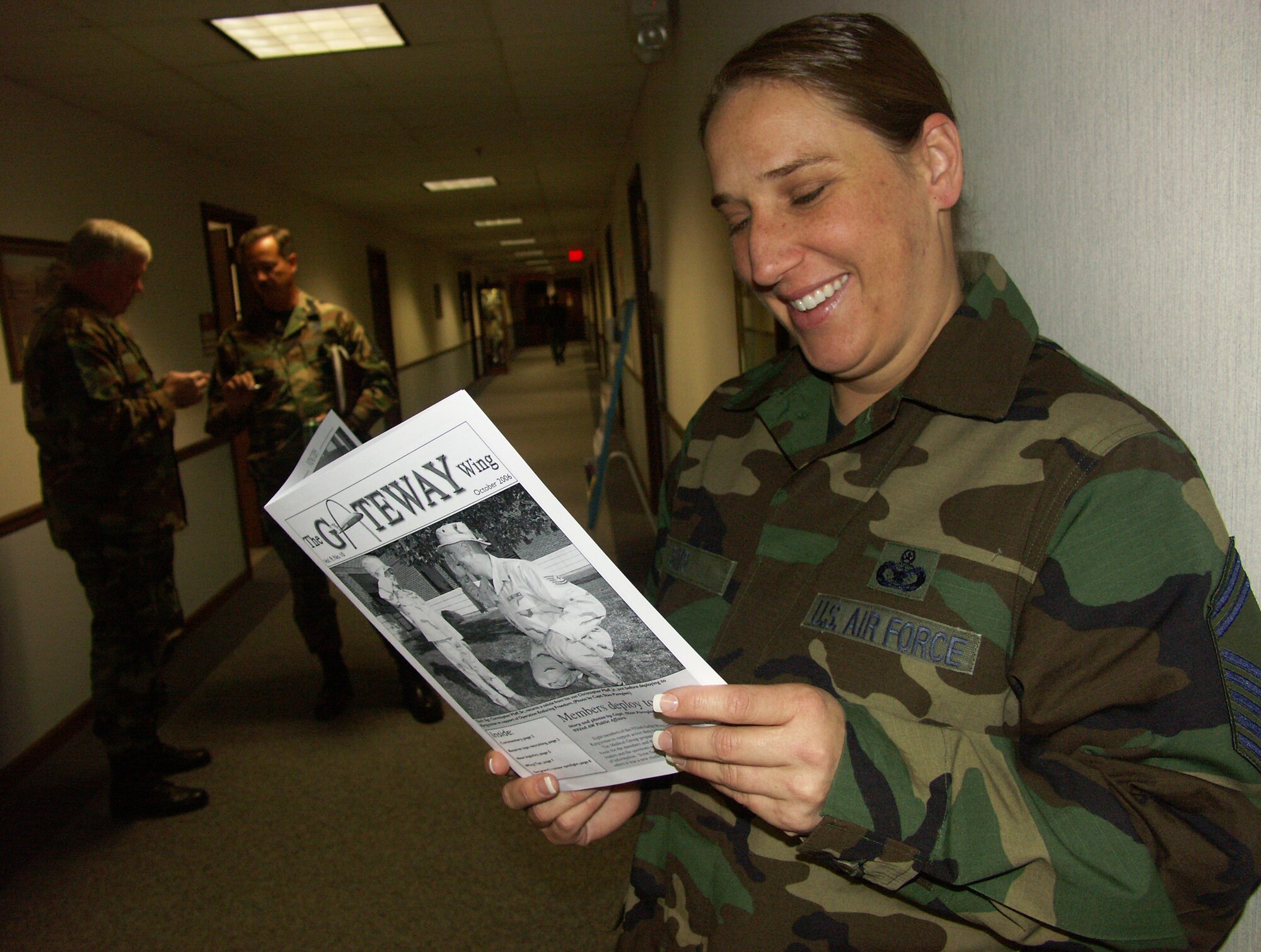 A satisfied Gateway newspaper reader gets a laugh from a recent issue of the 932nd 
Airlift Wing issue.  Tell us your story!