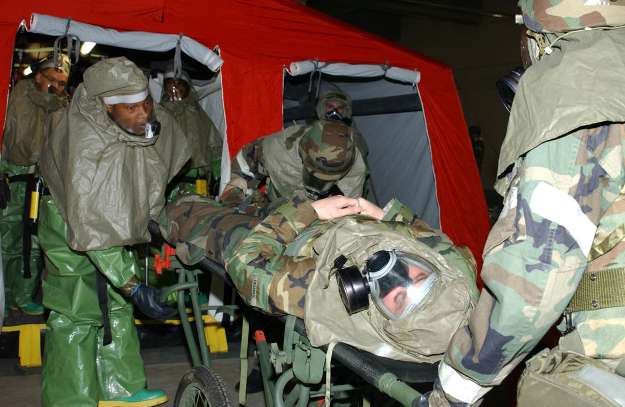 02/09/2007-MISAWA AIR BASE JAPAN --  Private First Class David Crandall, 403rd Military Intelligence Detachment, is carried on a stretcher during Operational Readiness Exercise 07-05 Feb. 9 here. (U.S. Air Force photo by Airman 1st Class Eric Harris) 