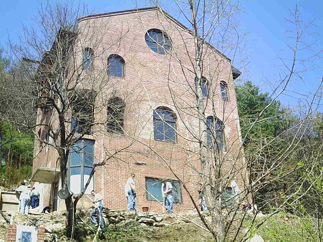 SEOUL, Republic of Korea --  Osan Airmen help work on Father Paul's Church here. (Courtesy photo)