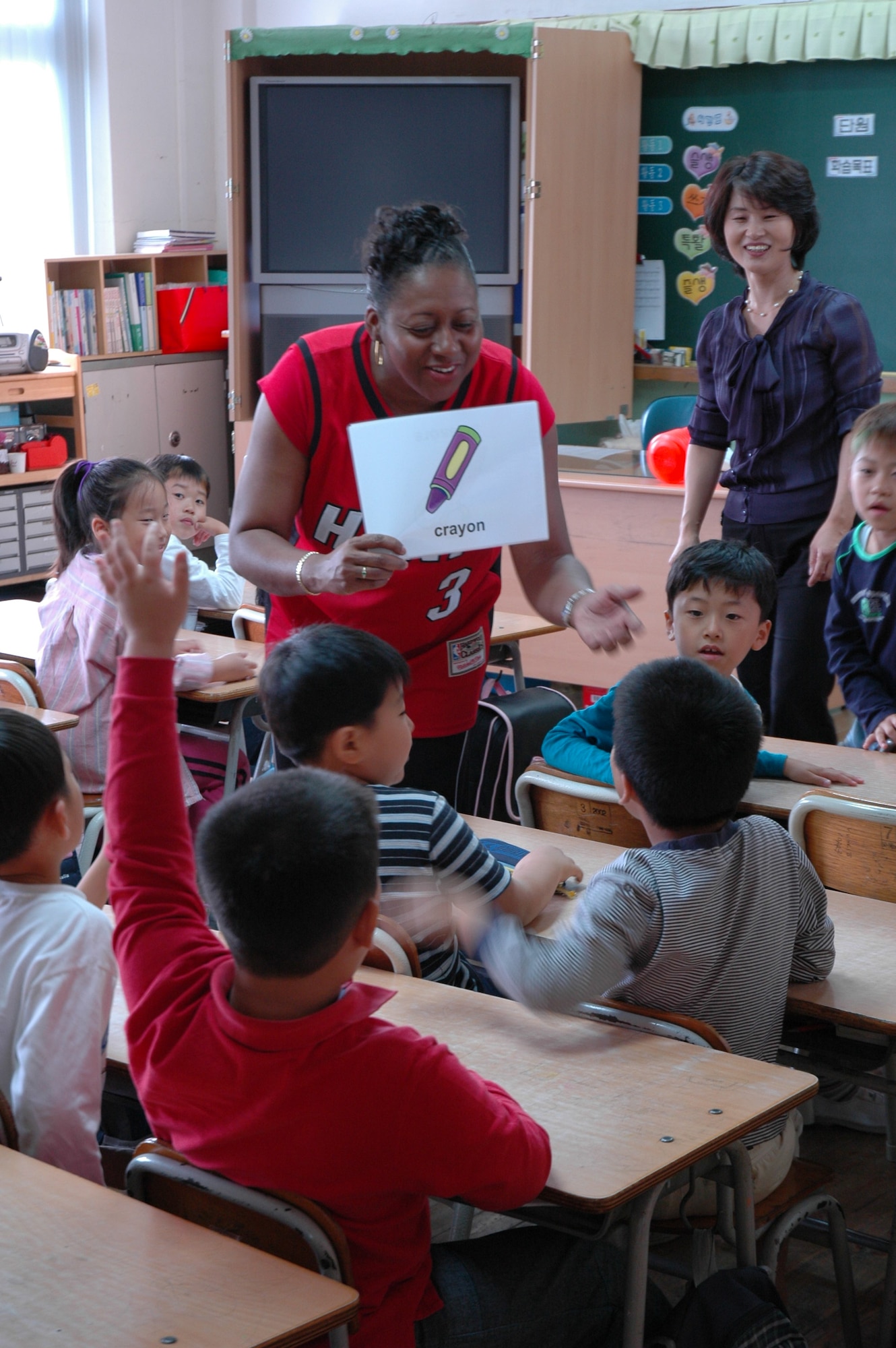 SUWON, Republic of Korea --  Maj. Mary Brookins and a group of Airmen from Osan Air Base visit Mae Sun Elementary School in September. (U.S. Air Force photo by Tech. Sgt. Michael O'Connor)