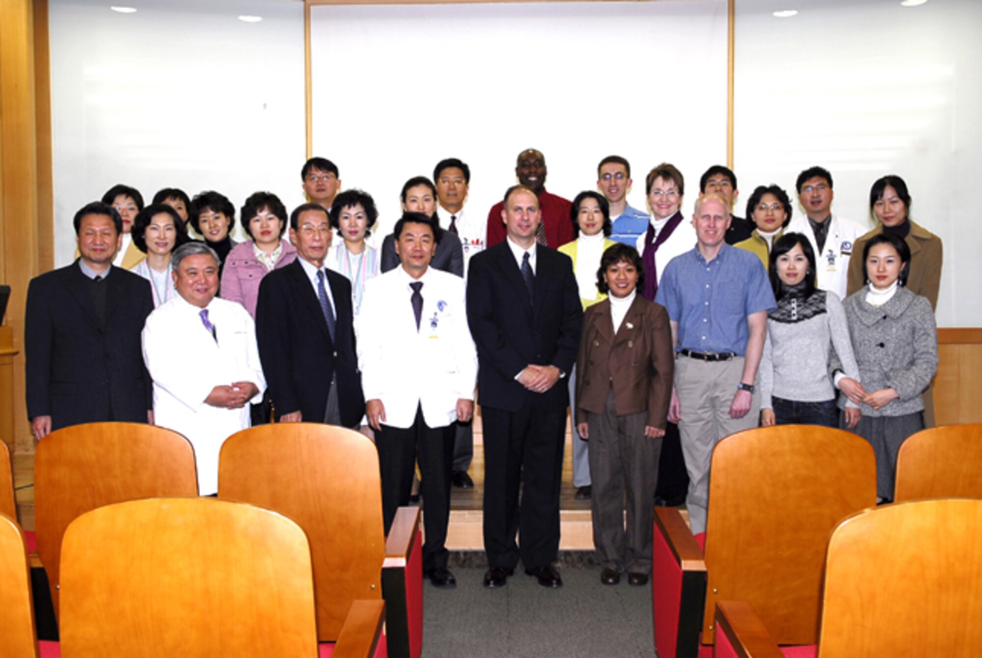 SUWON, Republic of Korea --  Members of the 51st Medical Group attended the Ajou University Hospital Medical English Class Graduation Ceremony in December.  Nurses stationed here helped Korean students with conversational-speaking skills to better prepare them for working with and caring for English-speaking people.  (Photo by Ms. Hyojung Woo)
