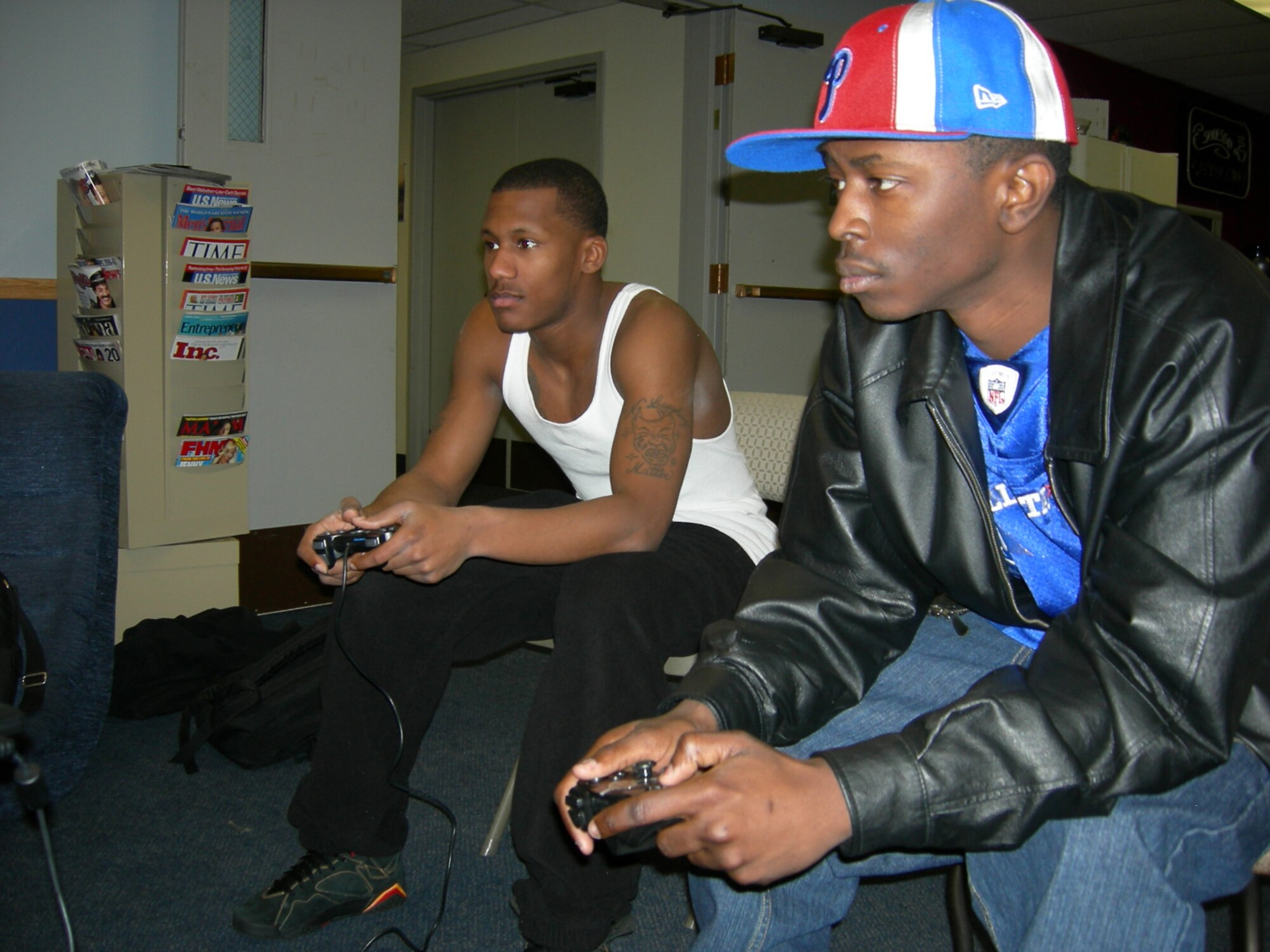 EIELSON AIR FORCE BASE, Alaska--Airmen 1st Class Brandon Williamson, 354th Aircraft Maintenance Squadron and Brandon Johnson, 354th Mission Support Squadron compete in a Madden NFL 07 Feb. 11 at the North Star Cafe in the basement of dorm building 2333. The winners for Feb. 11's PlayStation tournament were Airmen 1st Class Williamson and Mitch Mitchell, 354th AMXS. An XBox tournement was held Feb. 10; the winners were Airmen 1st Class Franklin Hayden, 354th Logistics Readiness Squadron and Brandon Johnson, 354th MSS. (U.S. Air Force photo by Airman 1st Class Nora Anton)