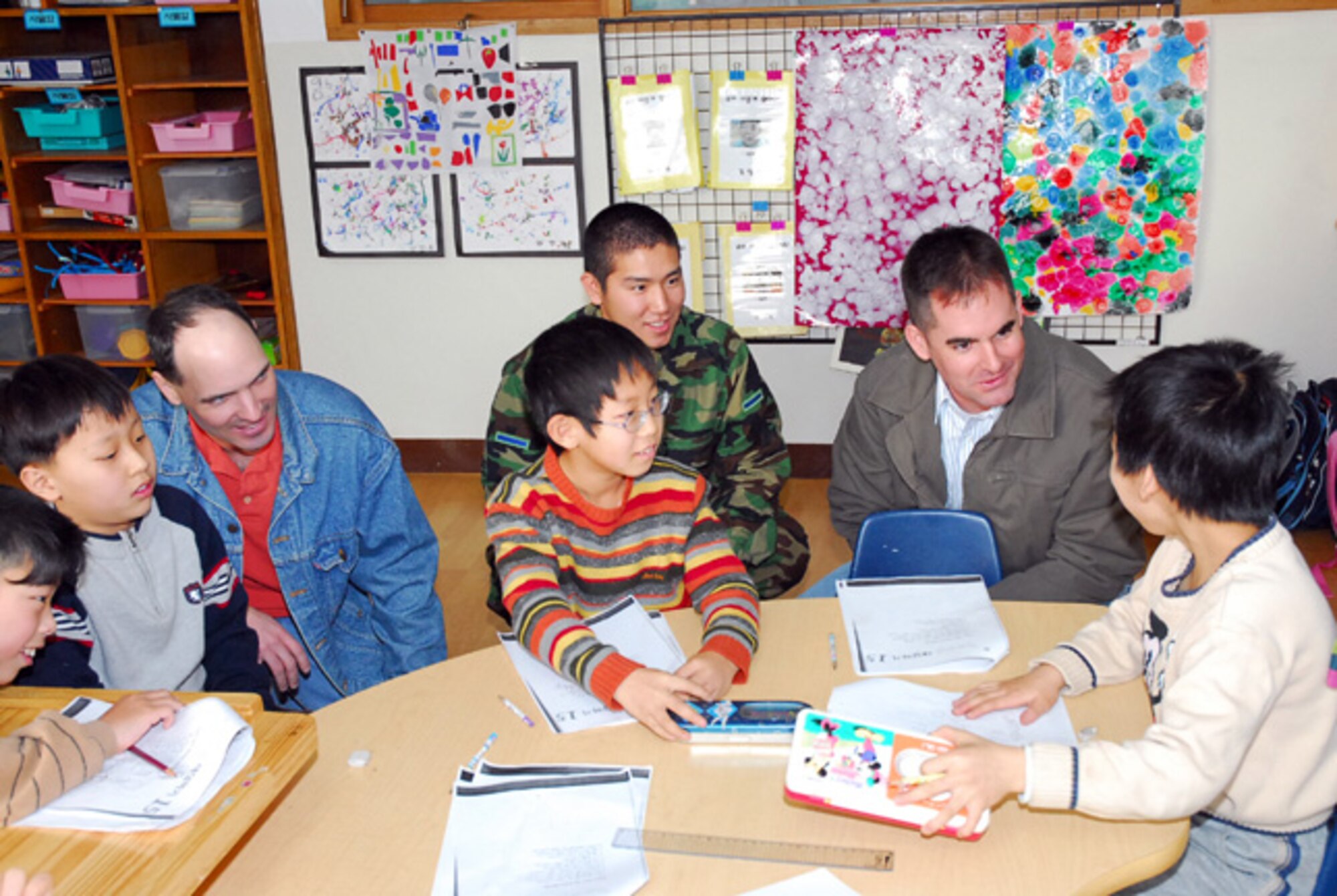 PYONGTAEK, Republic of Korea --  Republic of Korea and U.S. Air Force Airmen visit a learning center for children and young adults with disabilities. (Courtesy photo)