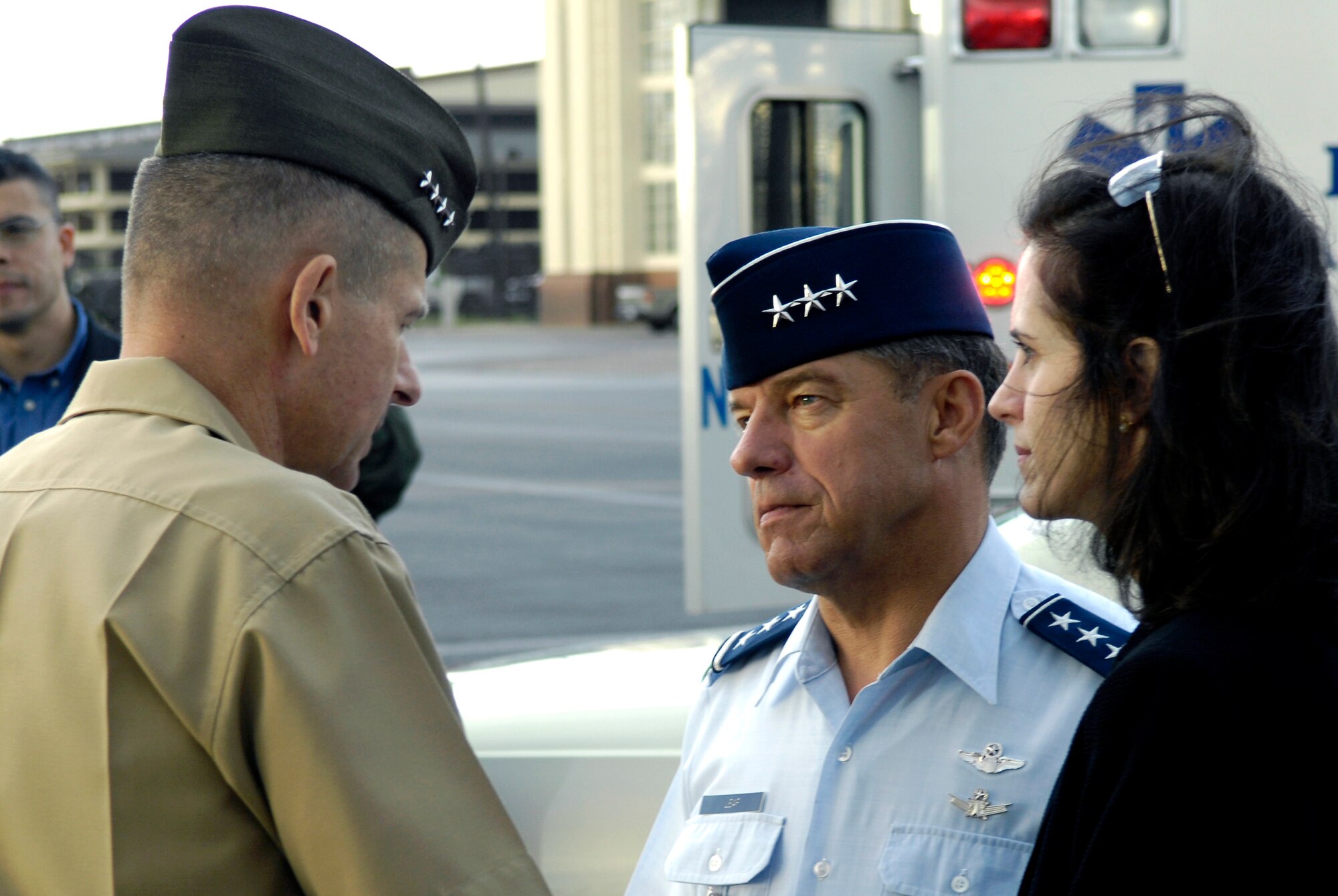 Gen. Peter Pace, chairman of the Joint Chiefs of Staff, talks with Lt. Gen. Dan Leaf, deputy commander of Pacific Command, and his wife Amy, upon arriving at Hickam Air Force Base, Hawaii, on Feb. 8. (U.S. Air Force photo/Staff Sgt. Myles Cullen) 
