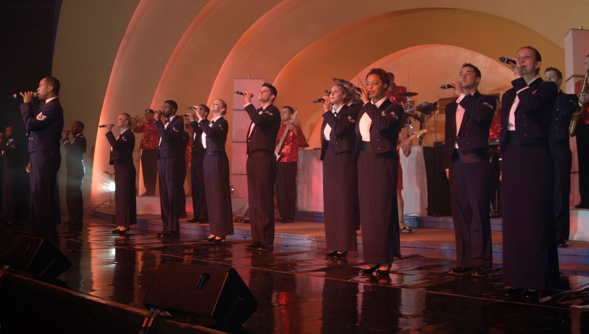 Members of Tops In Blue perform the last song of the night at the Cotillion Ballroom in Wichita, Kan. Jan. 31. Members of McConnell Air Force Base and the surrounding community enjoyed the free show despite cold weather conditions. Tops In Blue perform in various locations including hostile locations for deployed members. (Air Force photo by Senior Airman Jamie Train, 22nd Communications Squadron) 