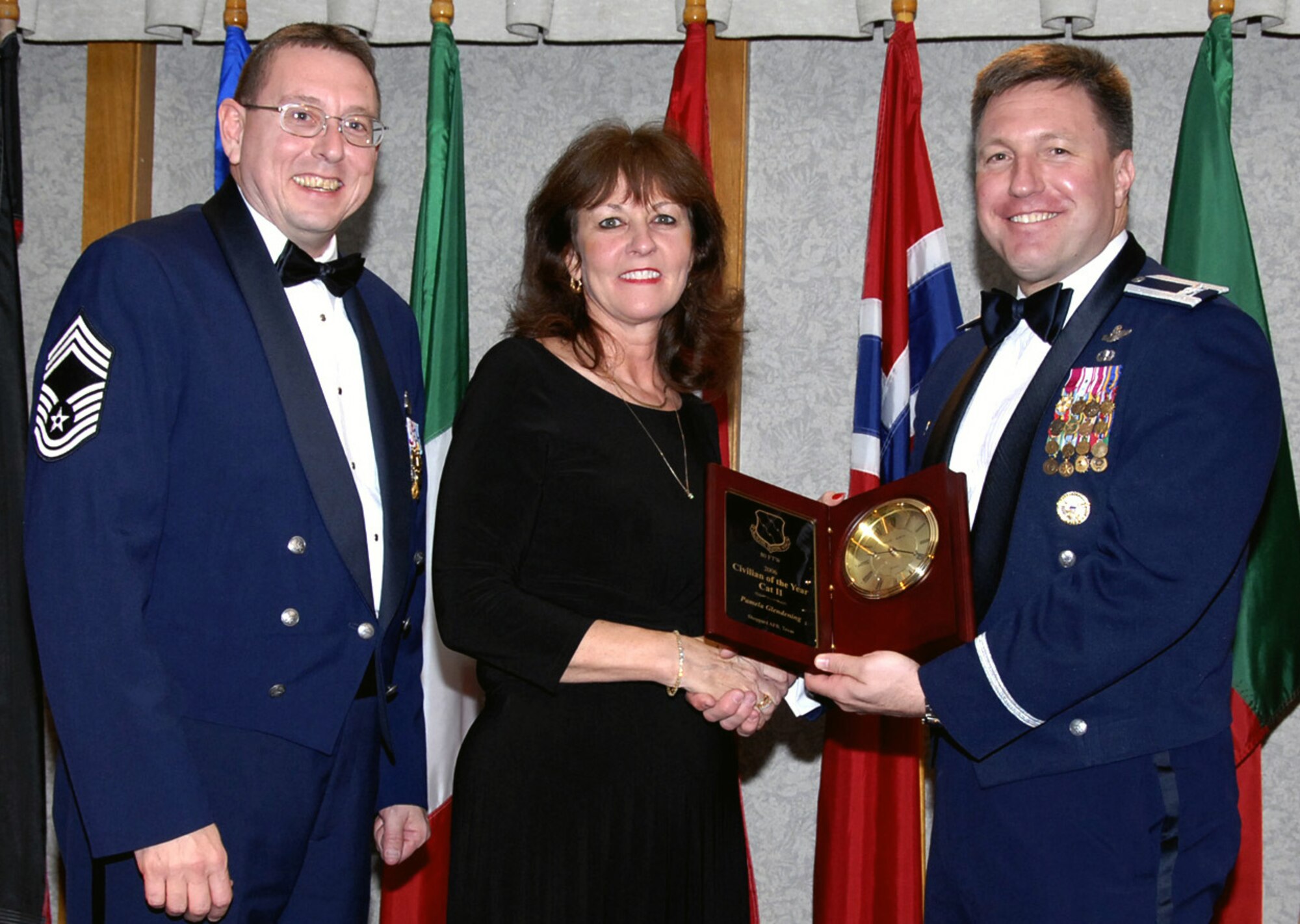 Pam Glendening of the 80th Operations Group is the 2006 Civilian of the Year, Category II, for the 80th Flying Training Wing. Ms. Glendening is recognized for her abilities of maintaining the wing's training actions. She processed eight training review boards, 16 pilot elimination actions, 59 training review actions and six introduction to fighter fundamentals and pilot instruction training flight evaluation board packages. She also training over 80 new instructors on the training review process. Ms. Glendening is also active in the community, serving on the executive board of the Senior-Junior Forum in Wichita Falls. (U.S. Air Force photo/Harry Tonemah)