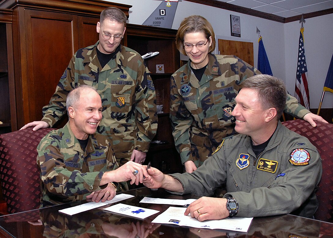 The 34th Annual Air Force Assistance Fund is underway at Sheppard with a target of $88,693.  Brig. Gen. Richard Devereaux, commander of the 82nd Training Wing, and 80th Flying Training Wing Commander Col. Jeffrey Kendall officially began the campaign Feb. 9 when they signed up to make contributions this year. Also pictured is Tech. Sgt. Edward Simonds, the point of contact for 82nd Training Wing Staff Agencies, and Maj. Dee Ann Mejia, the project officer for Sheppard's campaign. (U.S. Air Force photo/Harry Tonemah)