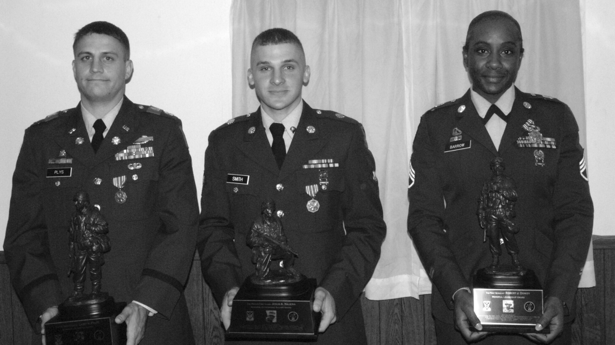 OSAN AIR BASE, Republic of Korea --  From left: Capt. Martin Plys, Fox Company, 1st Battalion, 43rd Air Defense Artillery Regiment. Spc. Jacob Smith, Headquarters and Headquarters Battery, 35th Air Defense Artillery Brigade, and Staff Sgt. Lyvia Barrow, HHB, 2nd Battalion, 1st Air Defense Artillery Regiment. (U.S. Army photo by Pfc. Dustin Roberts)