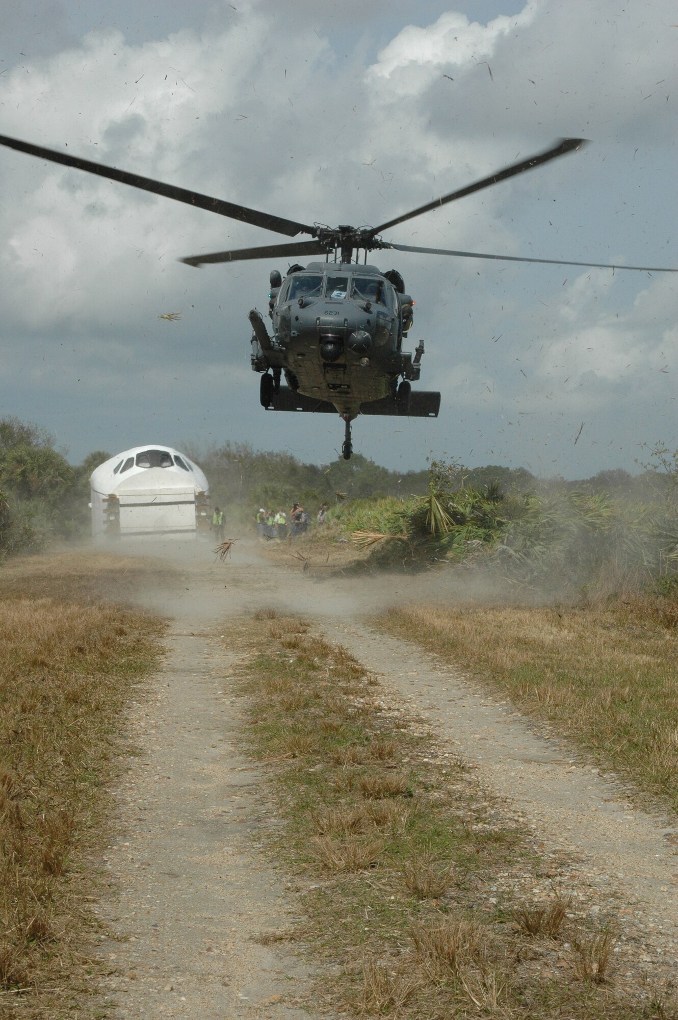 The Air Force Reserve's 920th Rescue Wing out of Patrick Air Force Base, Fla. responds to a NASA emergency exercise February 13.  Rescue crews from the wing's 301st rescue squadron provided the emergency airlift for the Air Force Reserve pararescuemen and the NASA emergency firefighters to a remote location on Cape Canaveral where the exercise took place.
