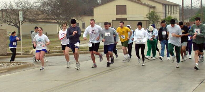LAUGHLIN AIR FORCE BASE, Texas -- Participants of the Valentine 5K run/walk start at 9 a.m. Feb. 10 in front of the Losano Fitness Center.  The Valentine event was organized by the fitness center and was open to everyone.  (U.S. Air Force photo by Senior Airman Brian Matosky)