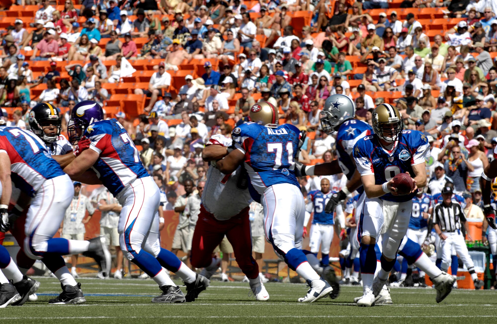 The Pro Bowl is the National Football League's all-star showcase pitting top stars from the American Football Conference and the National Football Conference. Held the week after the Super Bowl, the nationally televised exhibition game has been played in Honolulu since 1980. Servicemembers from all branches of the U.S. military in Hawaii participated in Pro Bowl activities. (U.S. Air Force photo/Tech. Sgt. Shane A. Cuomo) 
