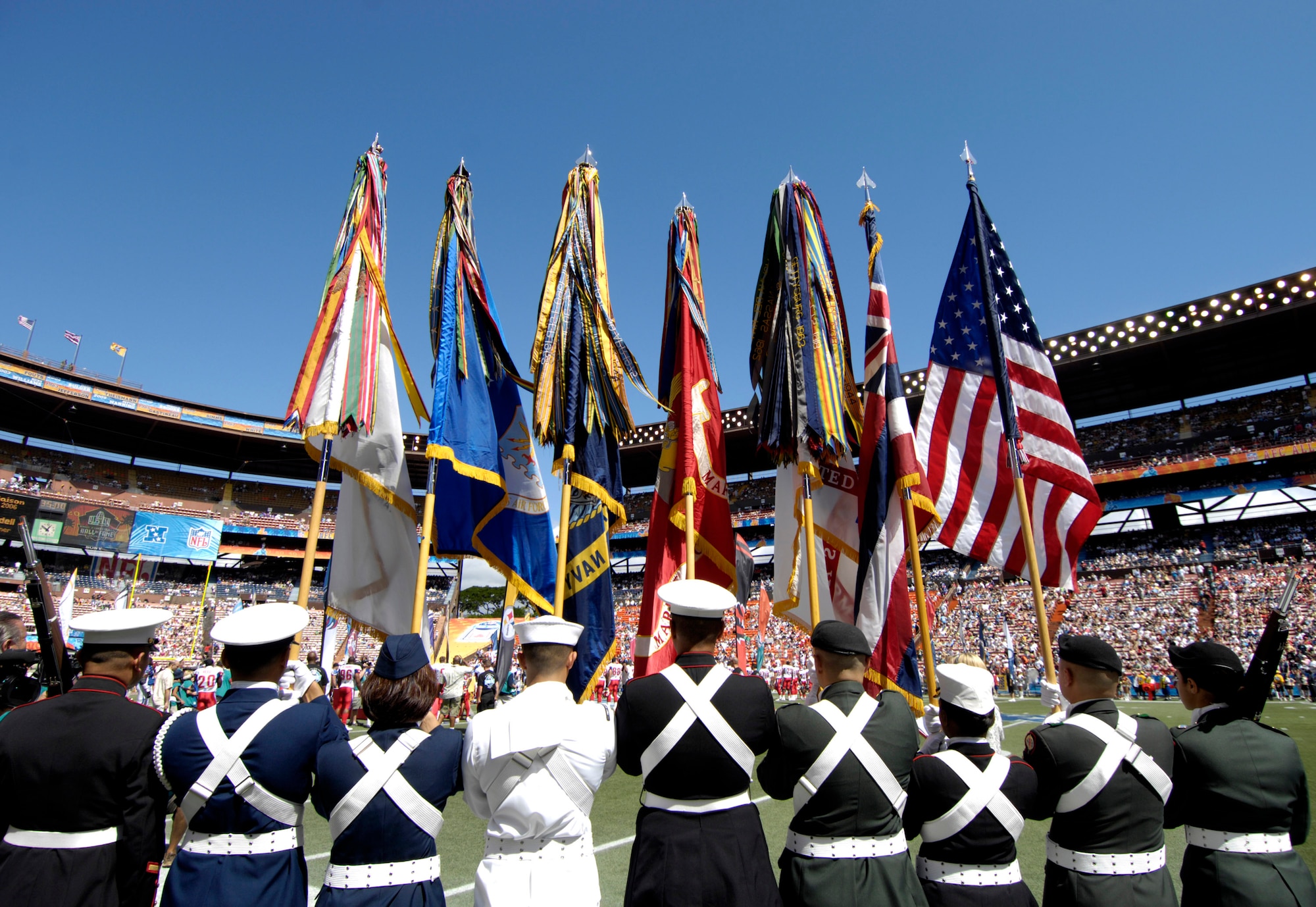 A joint-service honor guard waits to take the field during the opening ceremonies of the 2007 Pro Bowl Feb. 10 at Aloha Stadium in Hawaii. Servicemembers from all branches of the U.S. military in Hawaii participated in Pro Bowl activities. The Pro Bowl brings together the top players in the National Football League. (U.S. Air Force photo/Tech. Sgt. Shane A. Cuomo) 
