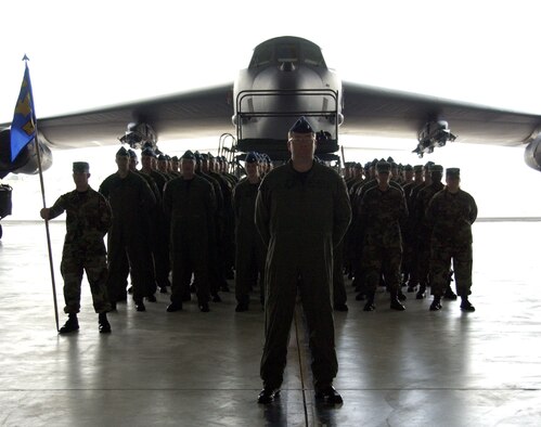 Airmen assigned to the 36th Operations Group stand in formation during the unit's reactivation ceremony at Andersen Air Force Base, Guam, Feb. 12. Six B-52 Stratofortress bombers from the 2nd Bomb Wing at Barksdale AFB, La., are deployed there to provide a continuous bomber presence in the Asia-Pacific region. (U.S. Air Force photo/Senior Airman Miranda Moorer) 