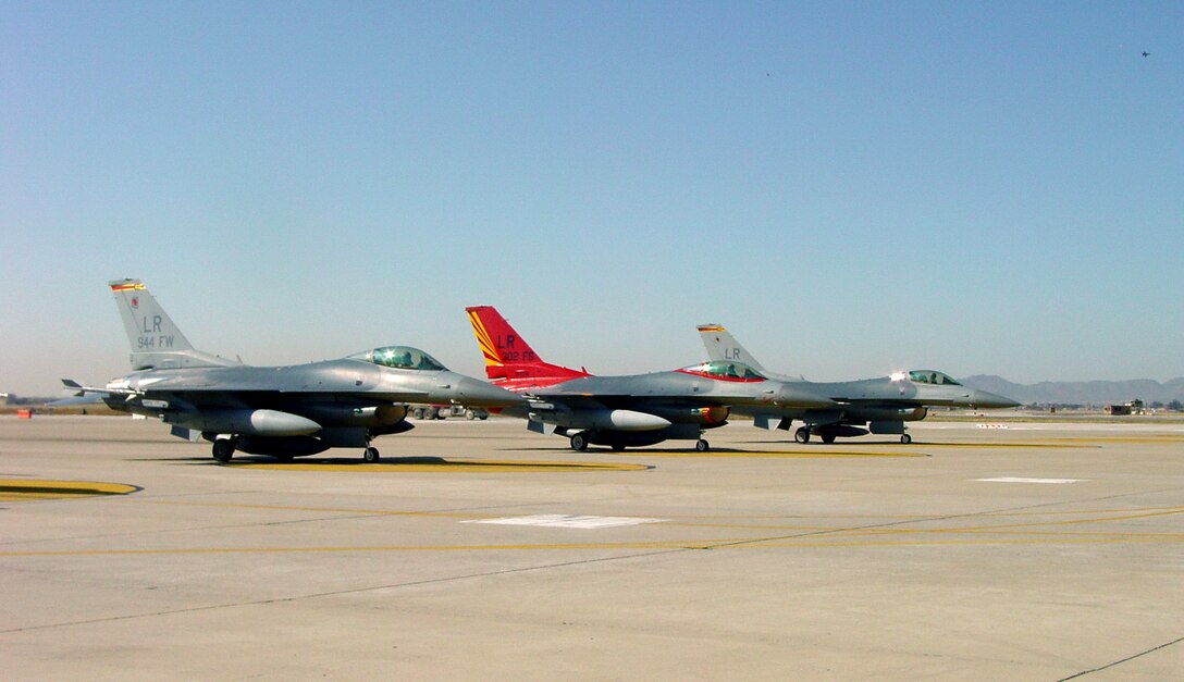 The last three 944th Fighter Wing F-16 Fighting Falcons depart Luke Air Force Base, Ariz., Feb. 12 as part of Base Realignment and Closure Commission actions to consolidate the service's declining fleet into fewer, larger units. (U.S. Air Force photo/Master Sgt. Dan Orzel) 