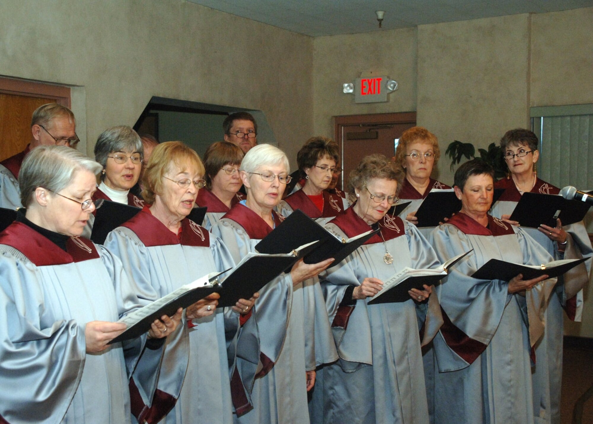 The Chancel Choir leads the audience in song during the National Prayer Breakfast Tuesday at the Base Chapel.