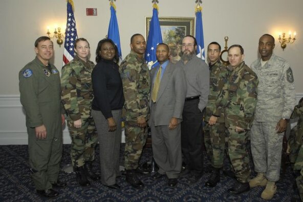 From left to right:  Gen Smolen, Capt Tara Parker, CGO of the Qtr; Ms Gloria Longmire, Civ of the Qtr, Category I; TSgt Antonio Lindsay, NCO of the Qtr; Mr Phillip Henry, Civ of the Qtr, Cat II; Mr Neal West, Civ of the Qtr, Cat III; SrA Gabriel Urdaneta, Airman of the Qtr; SMSgt Thomas Cooper, SNCO of the Qtr; Chief Monroe

 
