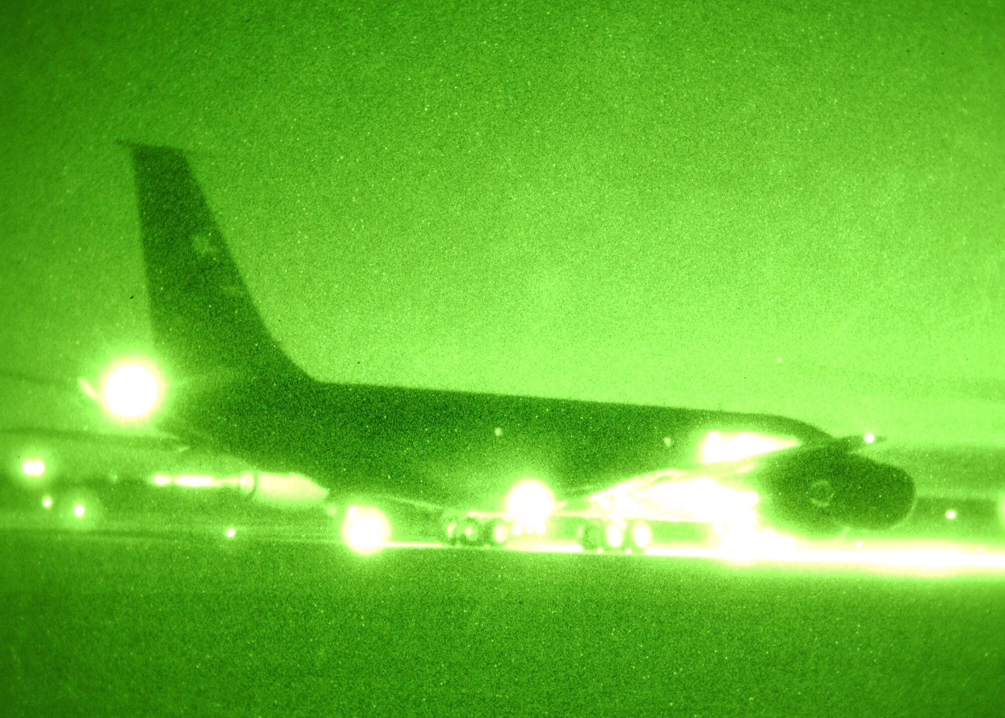 An Air Force Reserve KC-135 Stratotanker with the 940th Air Refueling Wing prepares to take off for a routine training night mission at Beale Air Force Base, Calif. Feb. 13, 2007.  The photo was taken with nightvision equipment. (U.S. Air Force photo/Staff Sgt. Luke Johnson)                                